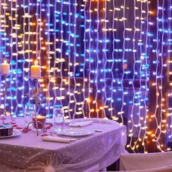 Twinkly Curtain Special Edition Tenda 210 LED Multicolore RGB+W Con Cavo Trasparente -Offerte Natale Negozio 0056083 twinkly curtain special edition tenda 210 led multicolore rgbw con cavo trasparente